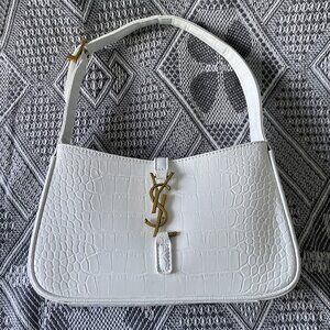 Yves Saint Laurent white handbag with gold YSL logo
